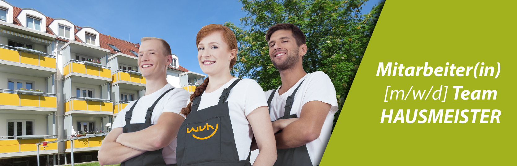 Bild eines Hausmeisterteams vor dem Wohnungsbestand der WVH